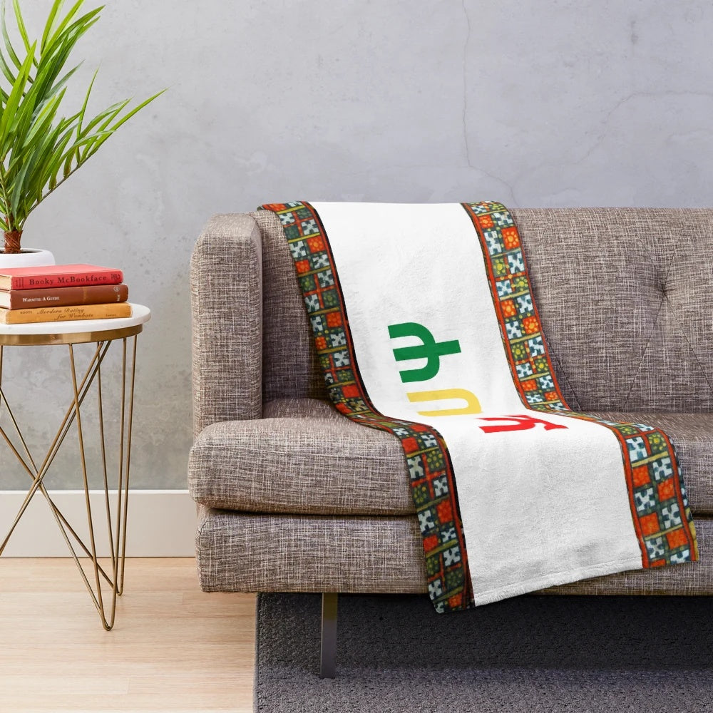 Soft and warm Ethiopian Habesha plush blanket with vibrant cultural design
