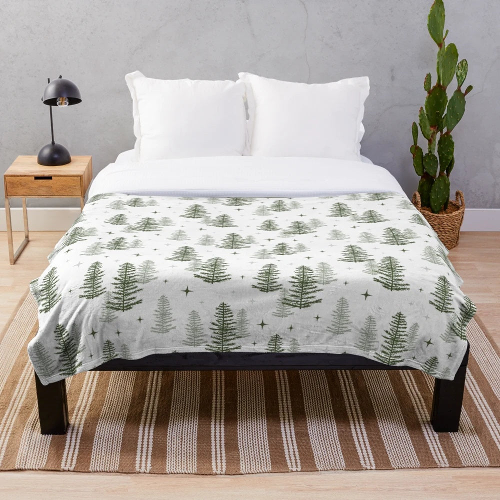 Soft and plush evergreen-patterned blanket for cozy winter nights