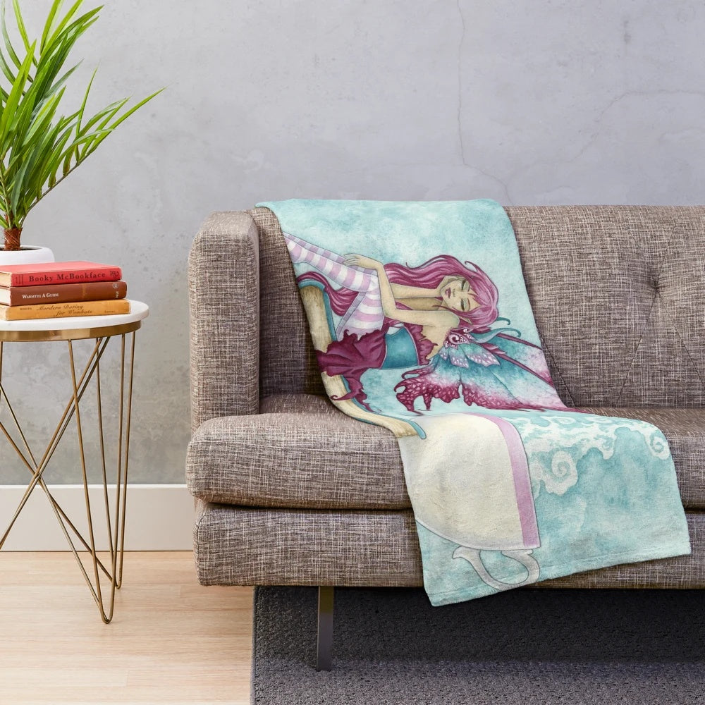 Cozy plush blanket with fairy and book design