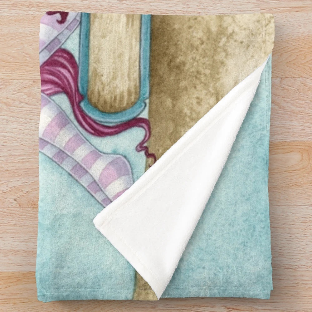 Cozy plush blanket with fairy and book design