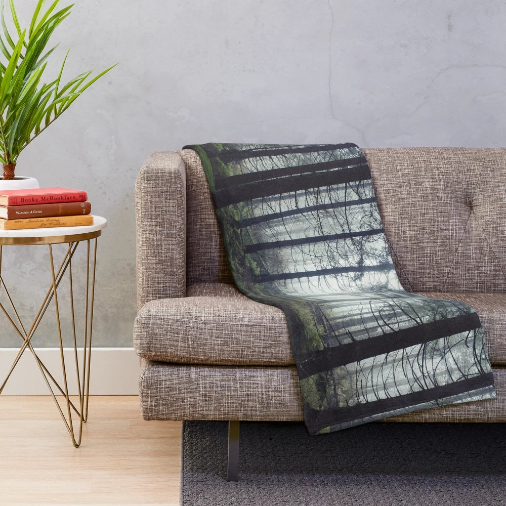 Plush blanket featuring a fairytale forest landscape with misty, enchanted woods