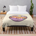 Soft and plush pumpkin-themed blanket with fall aesthetic design