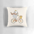 A plush, autumn-themed pillow featuring a cute and whimsical sloth riding a bike, perfect for home decor or gift-giving.