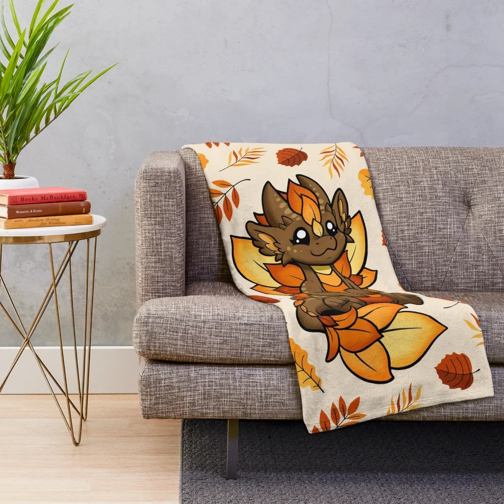 Soft and warm fall-themed dragon plush blanket