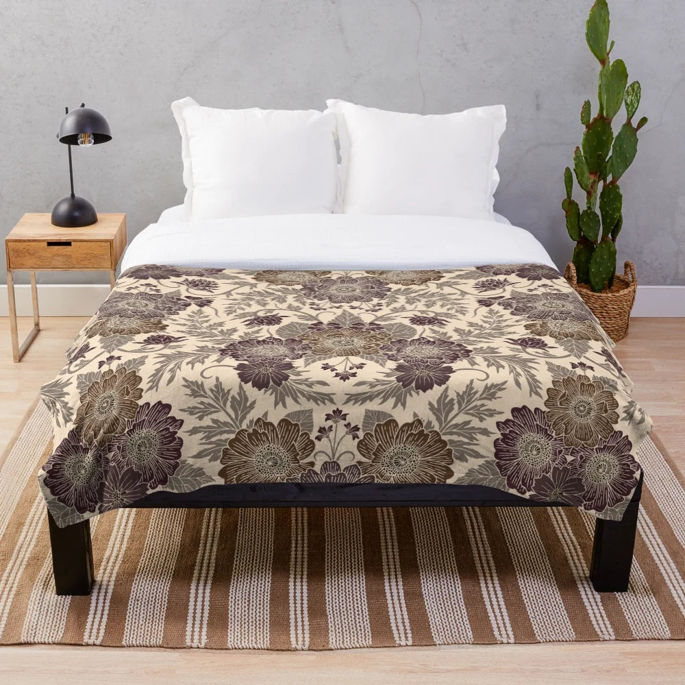 Soft and plush floral pattern blanket in autumnal colors of mauve and brown