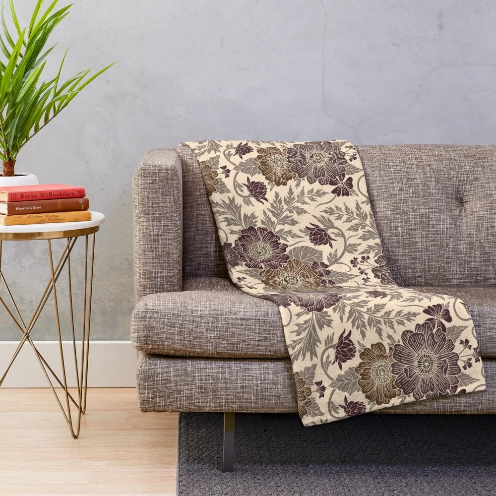 Soft and plush floral pattern blanket in autumnal colors of mauve and brown
