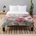 Plush blanket featuring a pastel watercolor painting of fall flowers