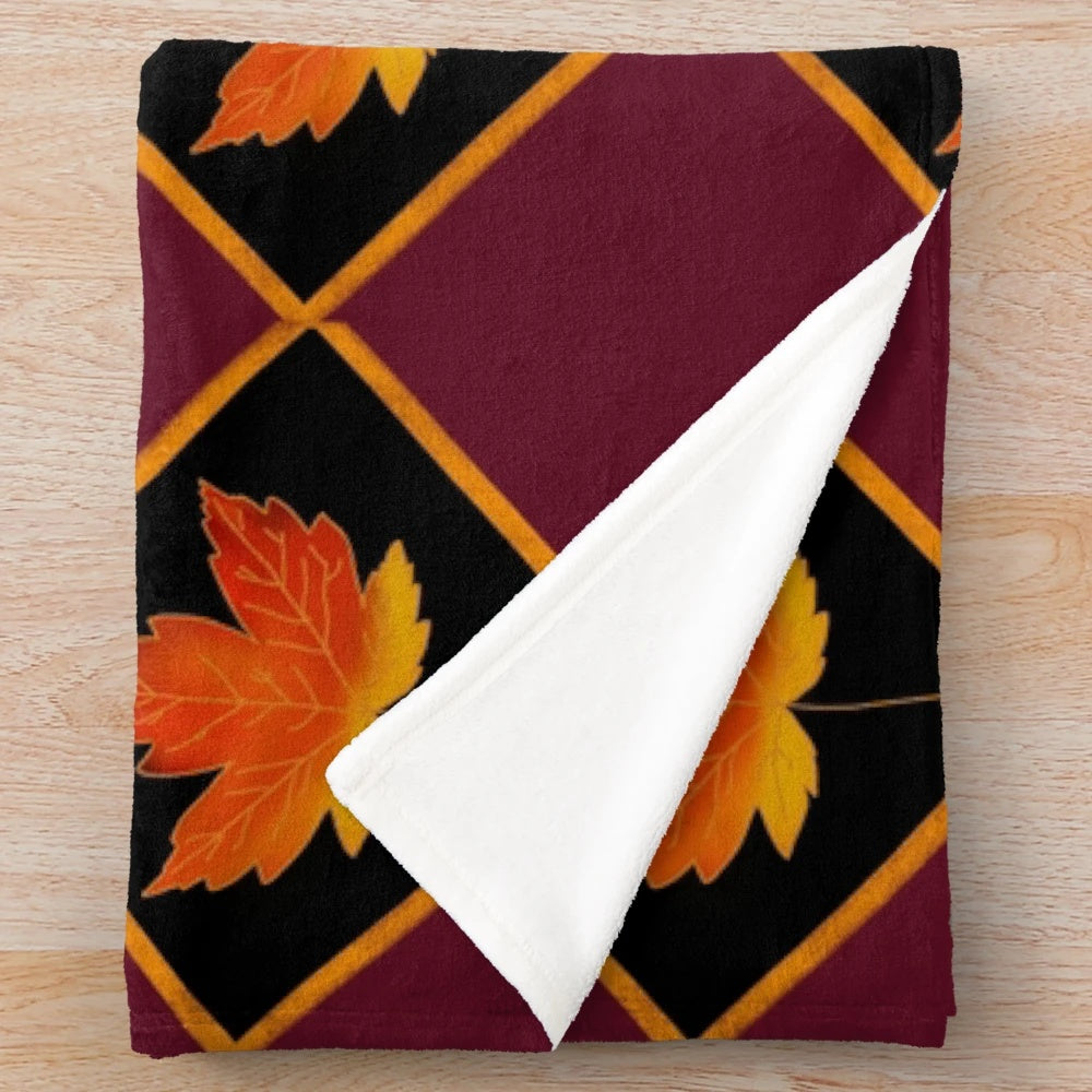 Plush blanket with fall leaf pattern design