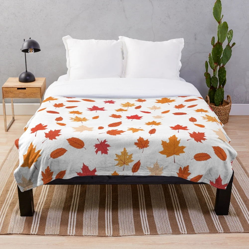 Fall leaves pattern on a soft, plush blanket