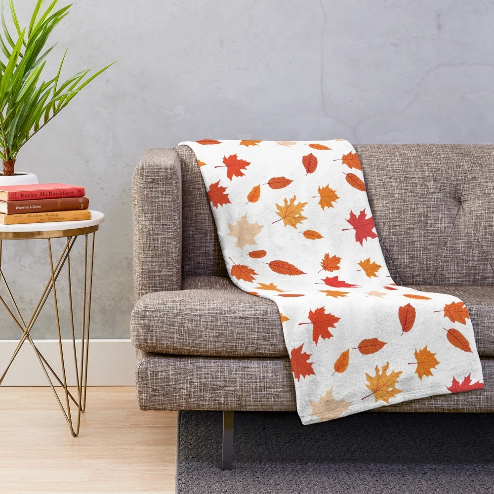 Fall leaves pattern on a soft, plush blanket