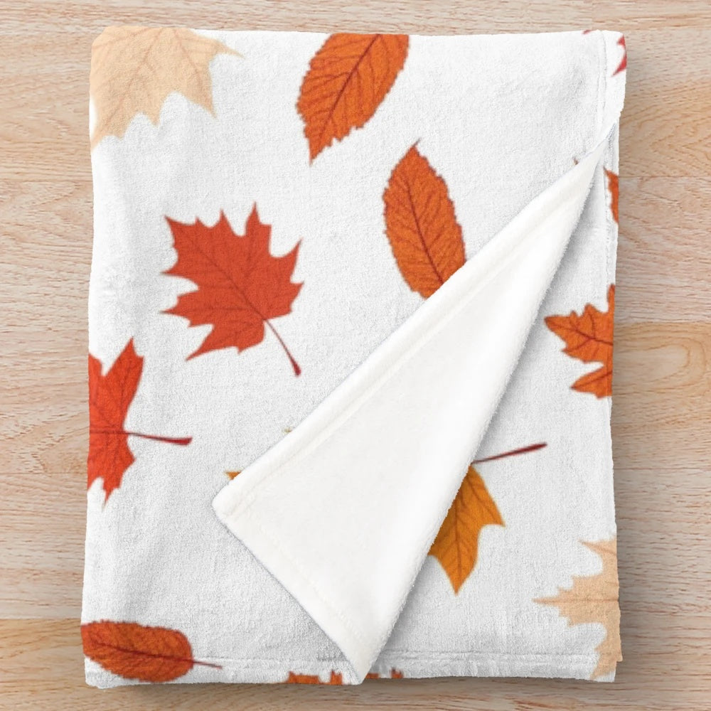 Fall leaves pattern on a soft, plush blanket