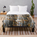 Plush blanket with fall leaves and waterfall design