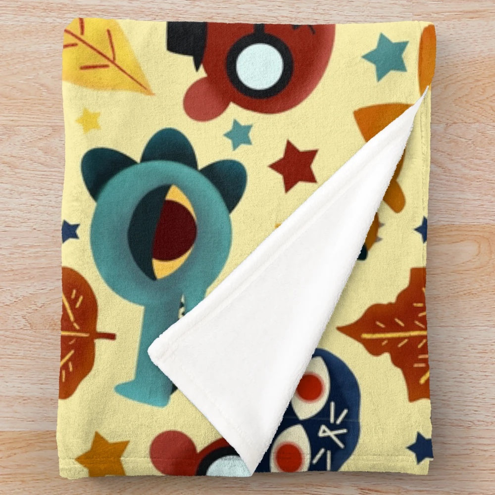 Plush blanket with a colorful fall pattern design inspired by the video game Night in the Woods