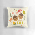 Decorative fall pillow with a charming acorn and leaf design, perfect for seasonal home accents.