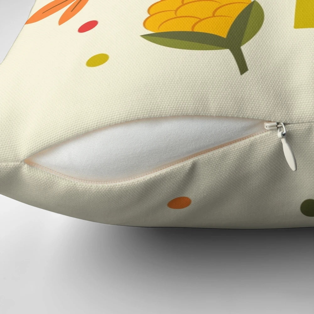 Decorative fall pillow with a charming acorn and leaf design, perfect for seasonal home accents.