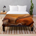 Cozy fall plush blanket with swirly art design