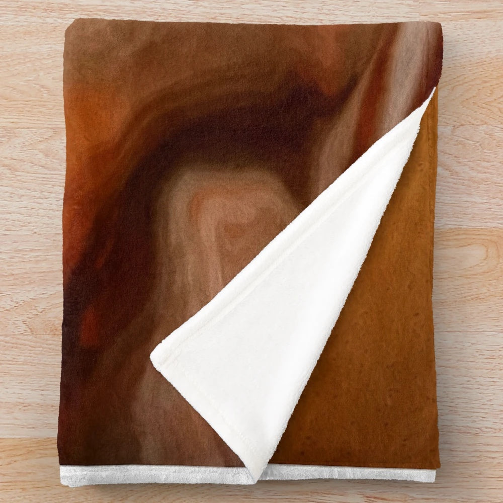 Cozy fall plush blanket with swirly art design