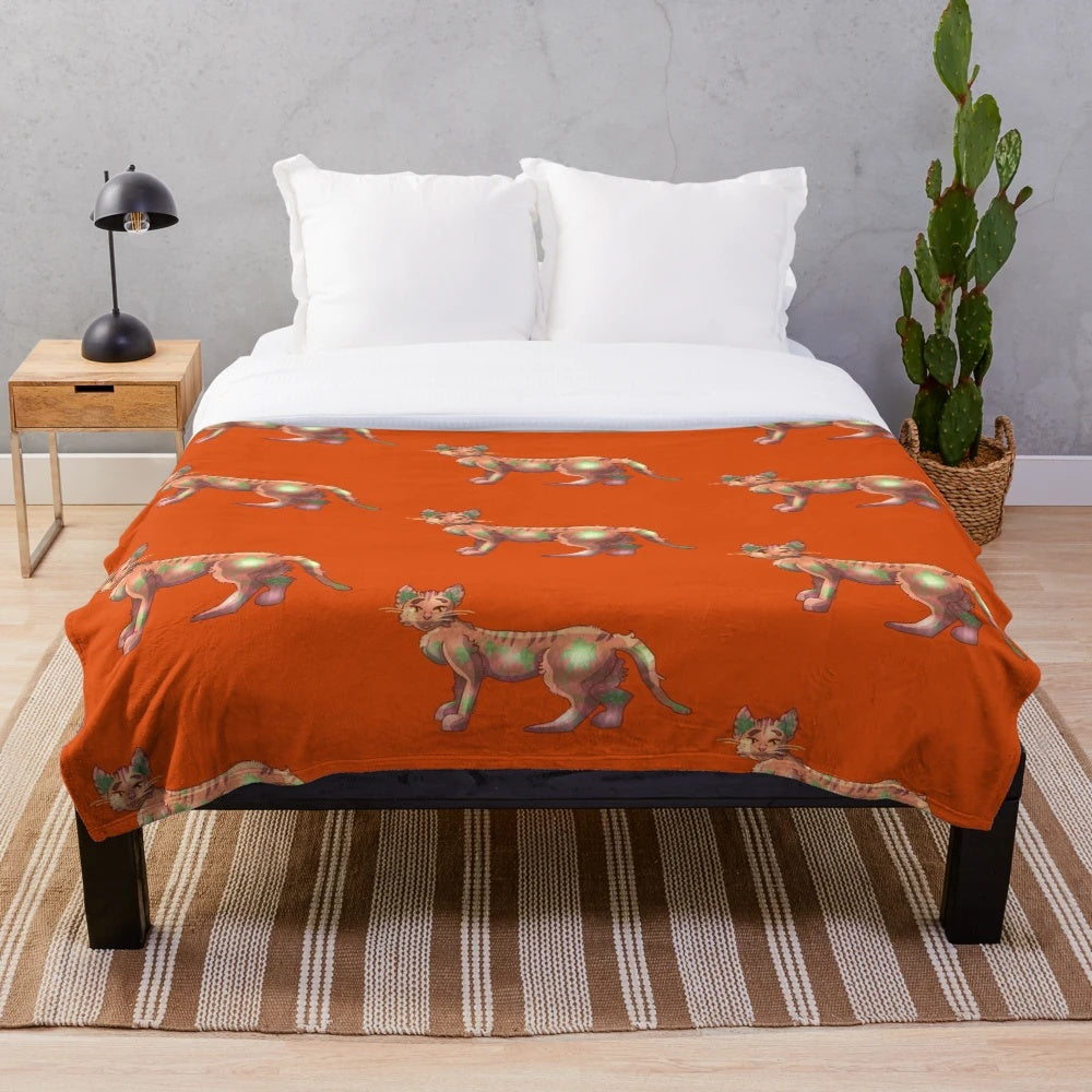 Soft and warm plush blanket featuring a cute pumpkin cat design
