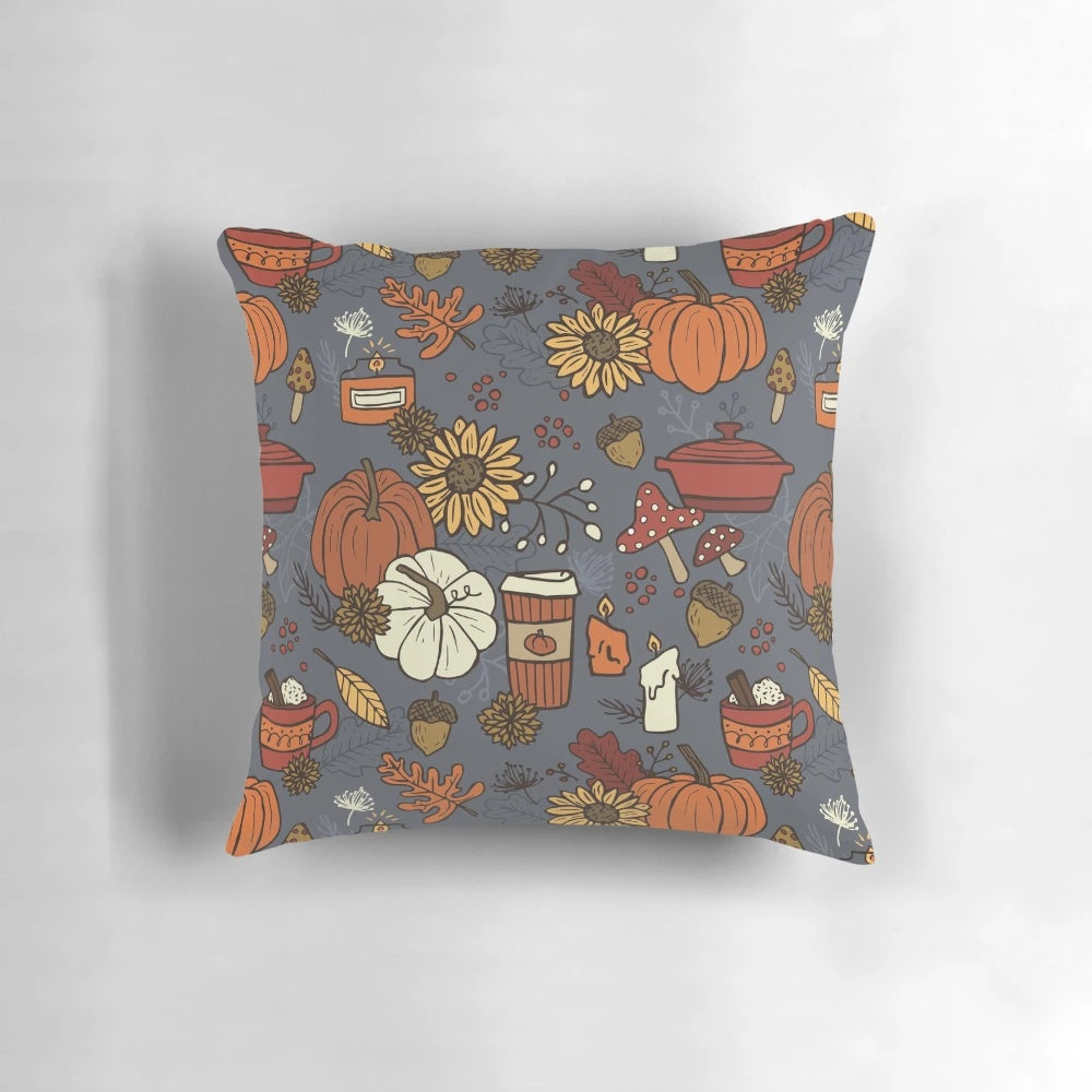Cozy fall-inspired pattern pillow featuring pumpkins, leaves, and other autumnal elements