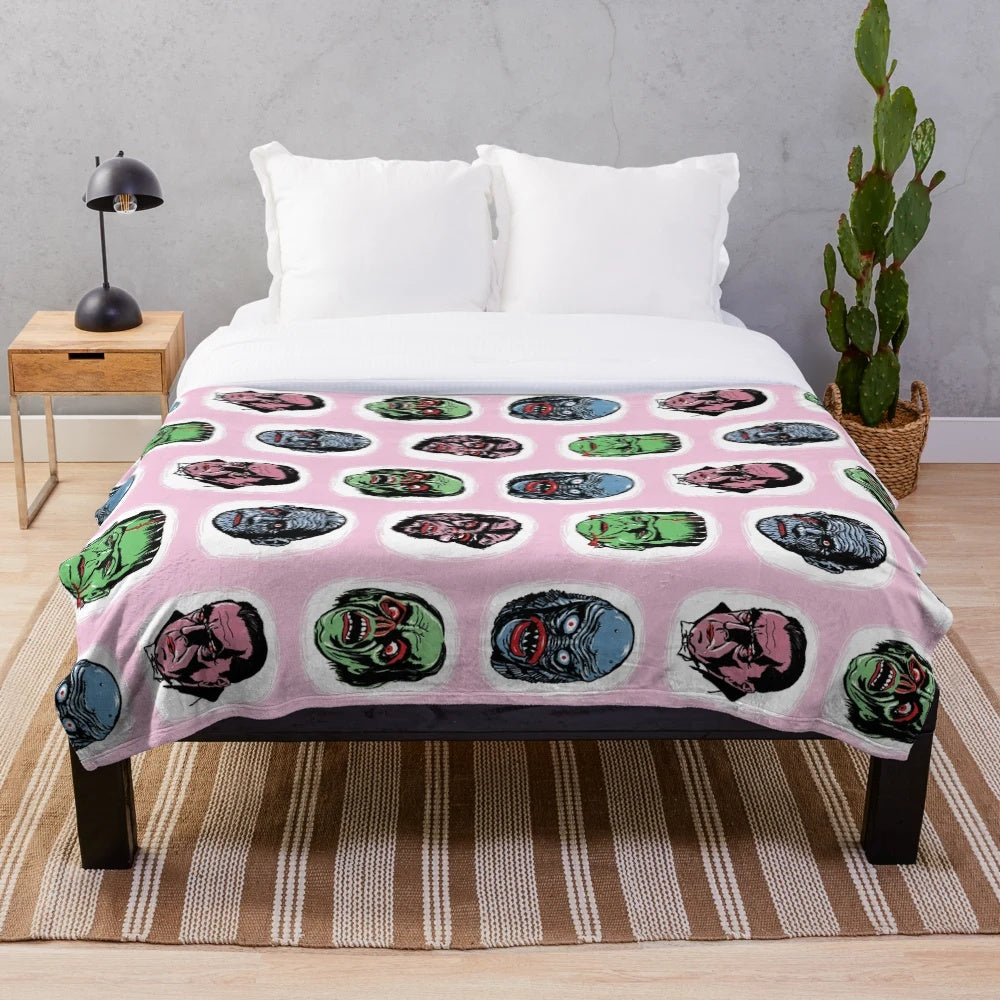 Famous Monsters plush blanket featuring iconic horror characters