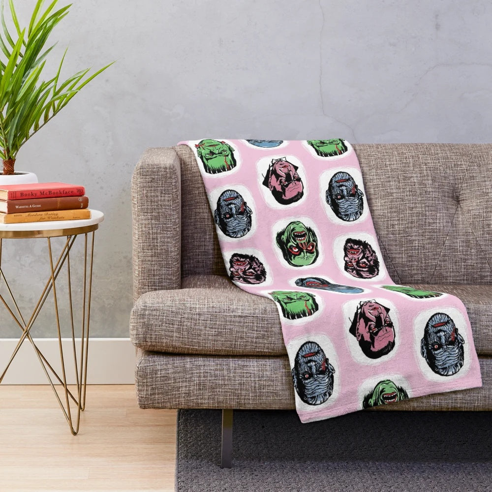 Famous Monsters plush blanket featuring iconic horror characters