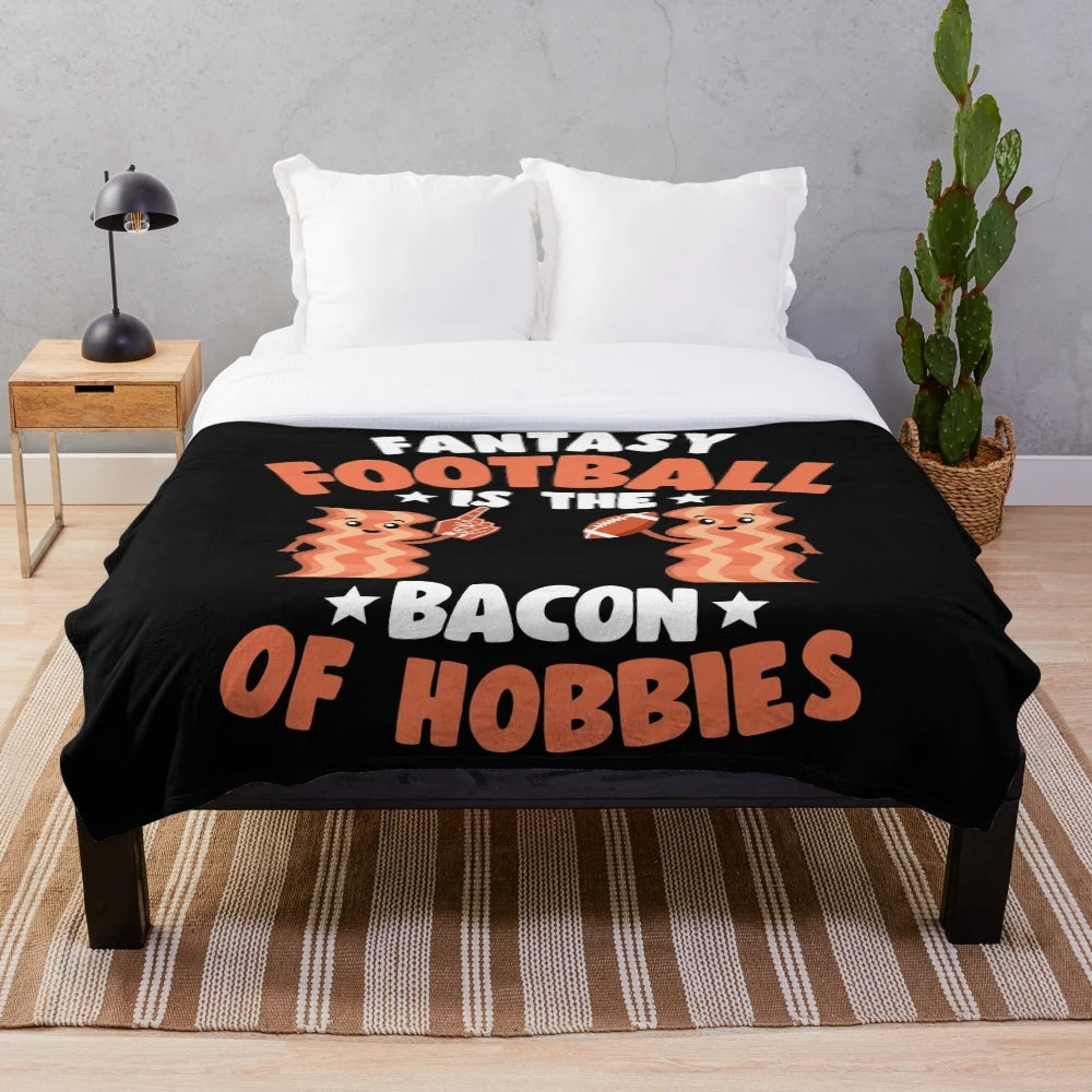 Plush blanket with a fantasy football and bacon themed design
