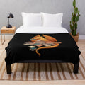 Cozy fantasy literature plush blanket with dragon, books, and library design