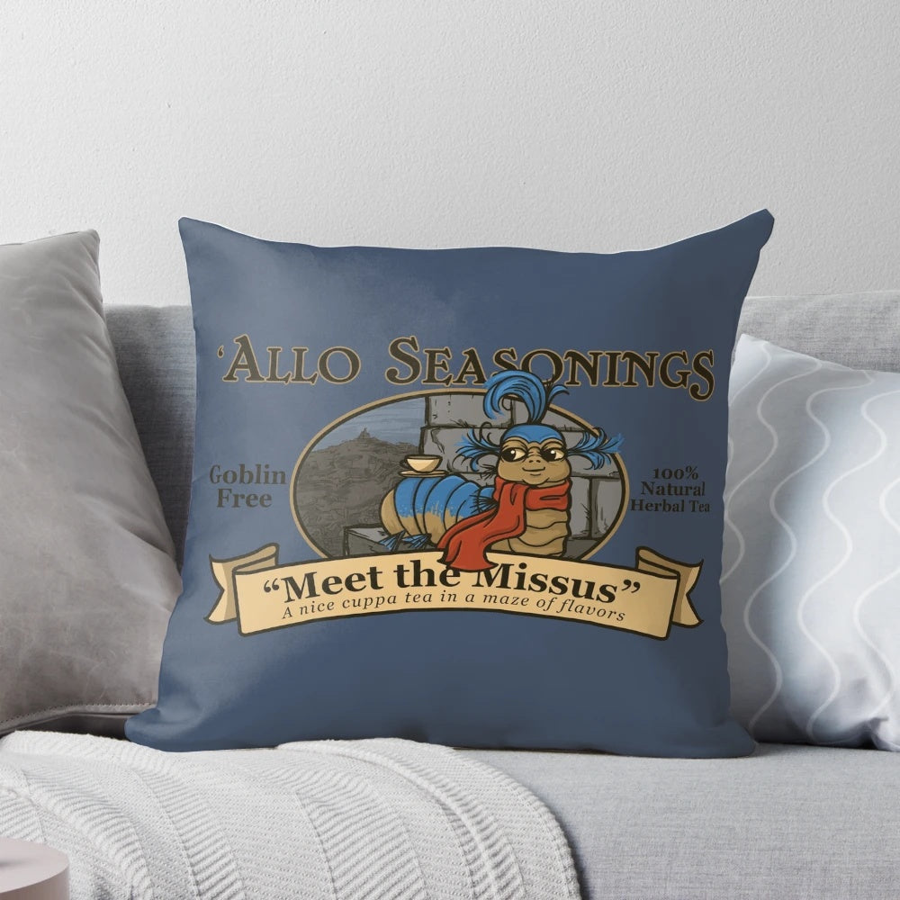 A plush, decorative pillow featuring a labyrinth design with a whimsical worm character, perfect for tea enthusiasts and 80s fantasy fans.