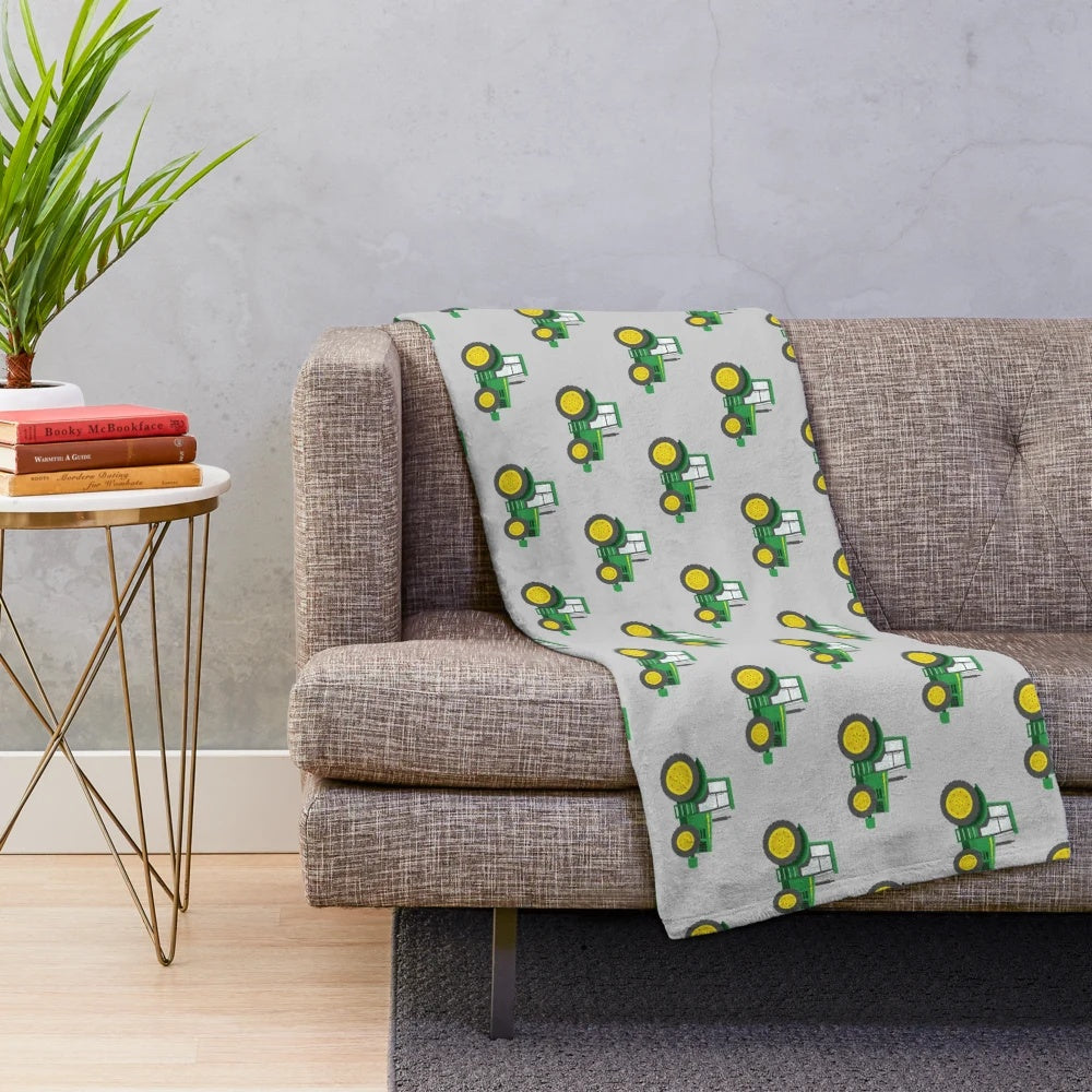 Green tractor plush blanket for farm themed decor