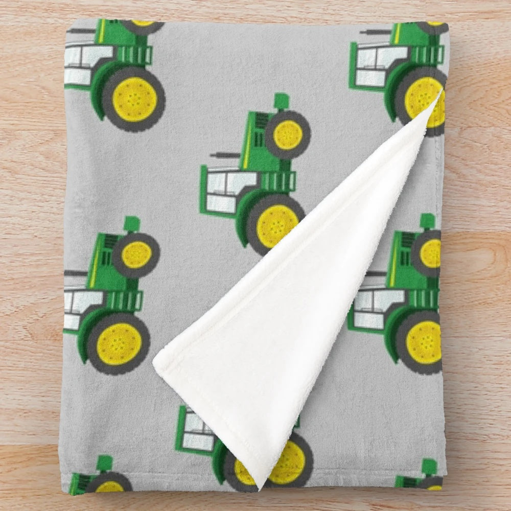 Green tractor plush blanket for farm themed decor