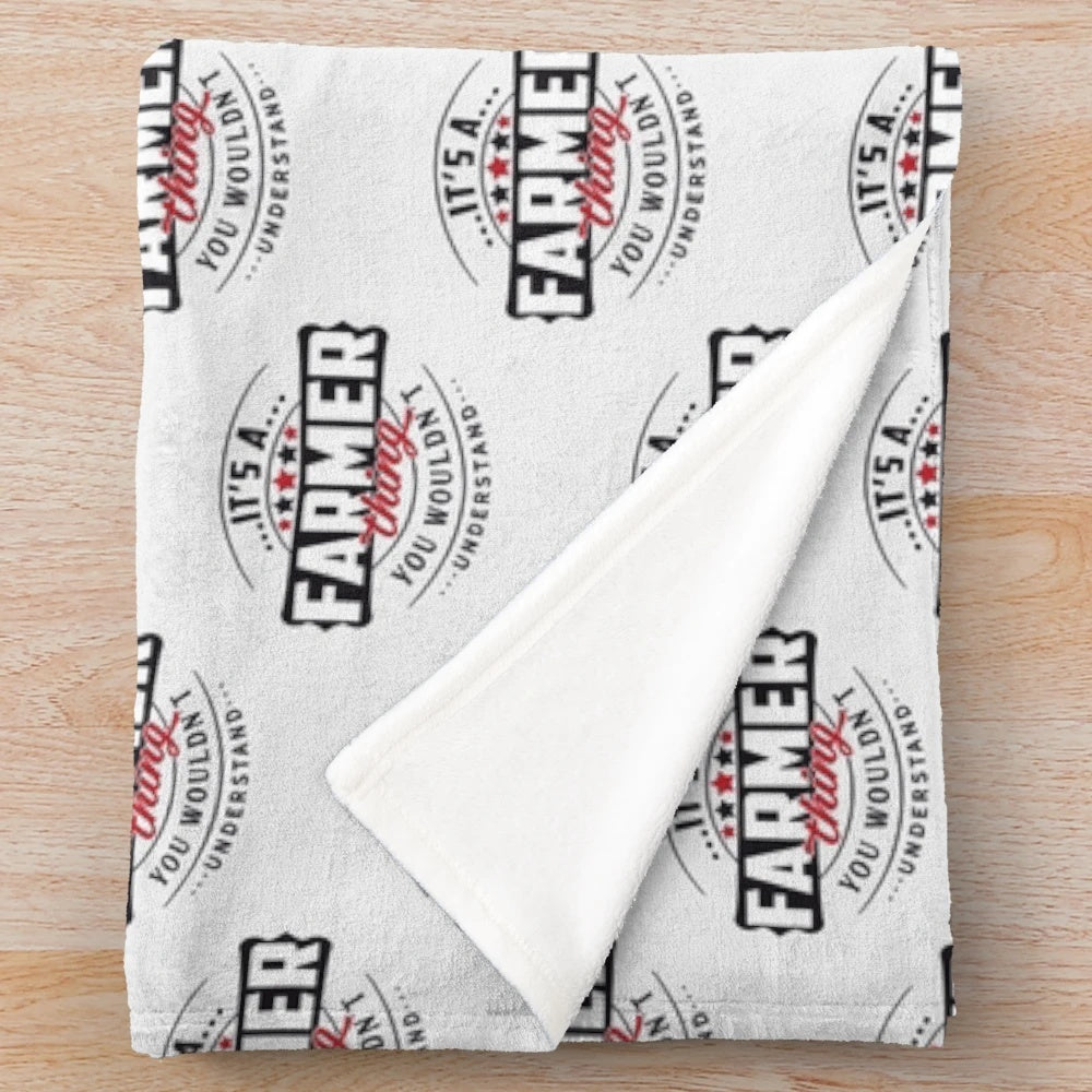 Farmer themed plush blanket with typography and farming imagery