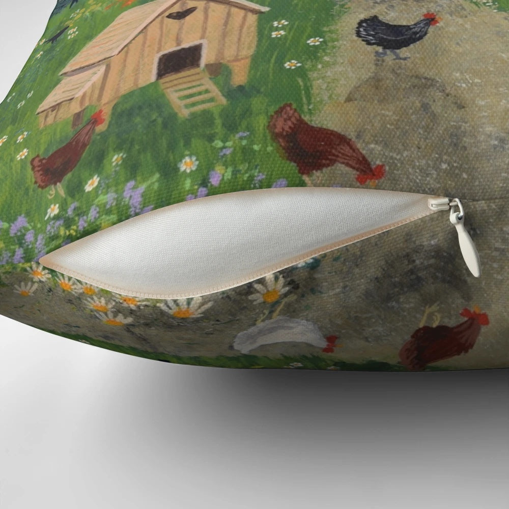 A decorative pillow featuring a charming country scene with chickens, horses, and a white cottage surrounded by a rural landscape.