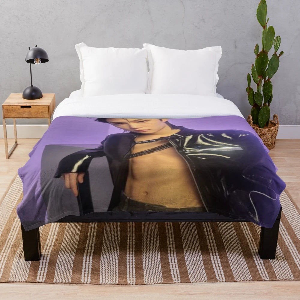 Soft and comfortable plush blanket featuring Felix, a member of the popular K-pop group Stray Kids