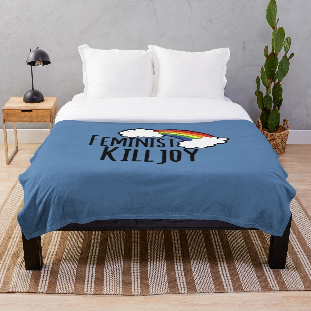 Feminist killjoy plush blanket with rainbow pattern