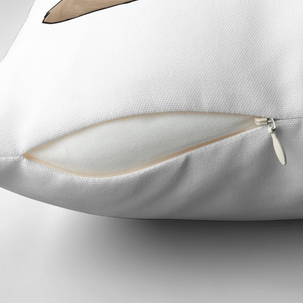 Tan colored pillow with a doodle illustration of a cute ferret or weasel-like animal