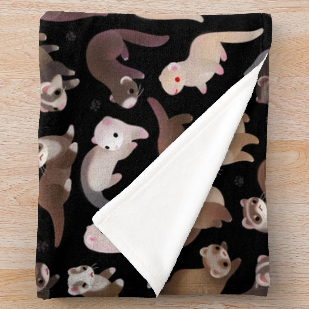 Soft and cuddly plush blanket featuring a dark sable ferret design