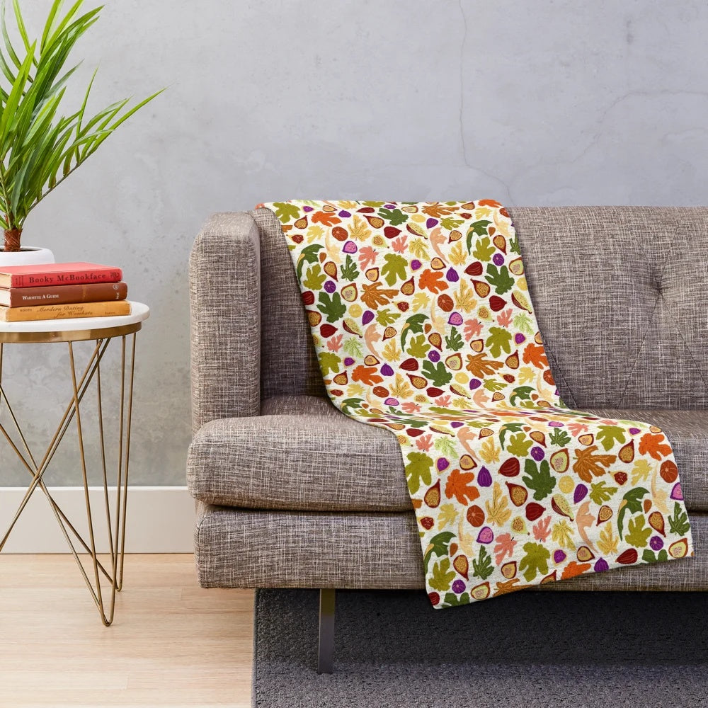 Vibrant plush blanket with fig dance and autumn orchard leaves design