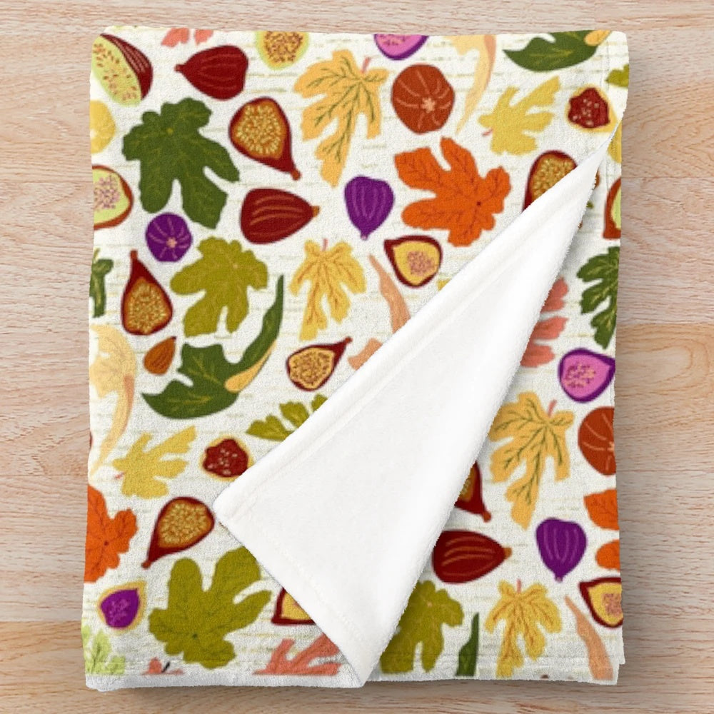 Vibrant plush blanket with fig dance and autumn orchard leaves design