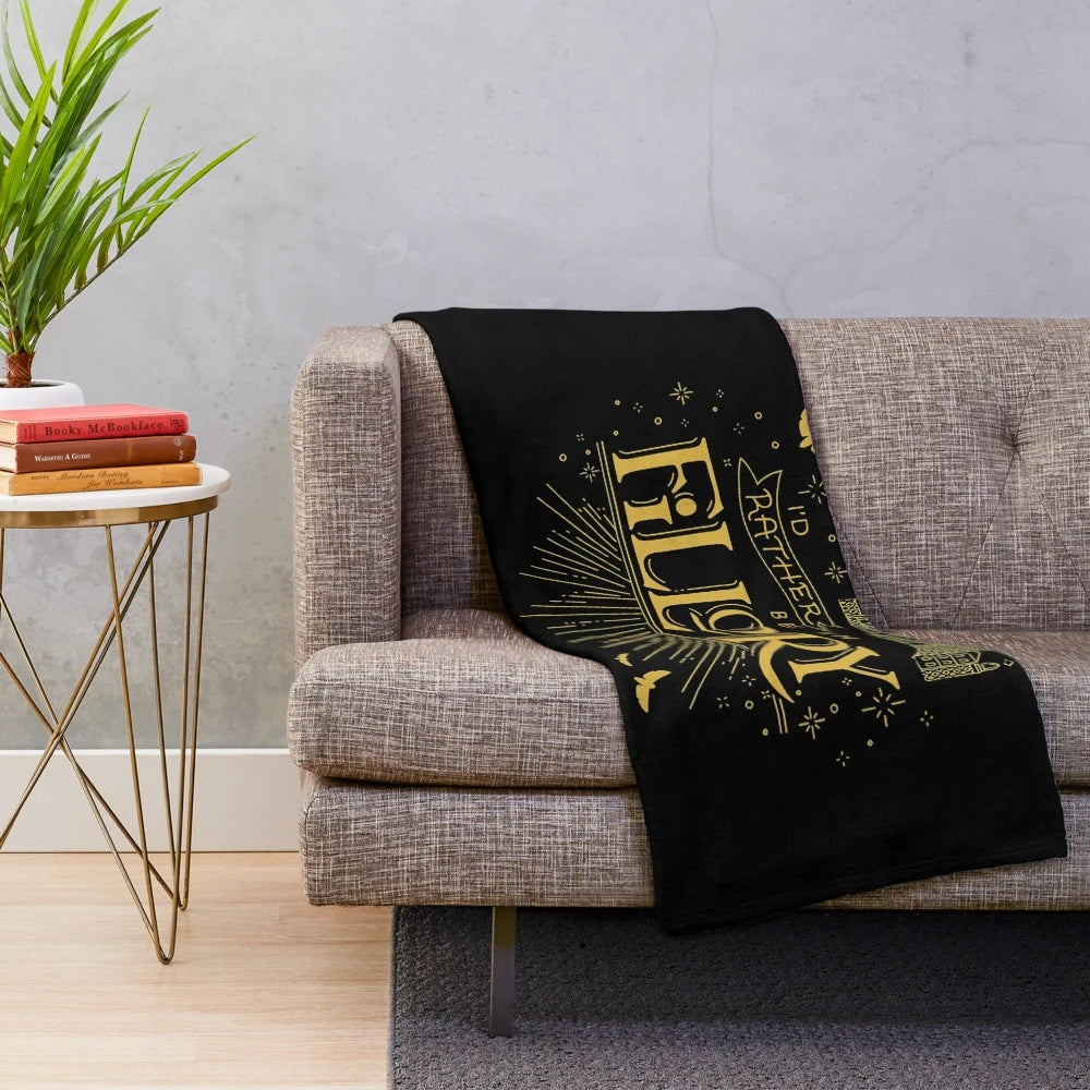 Cozy plush blanket with Fillory-inspired design, perfect for Halloween and holiday gifting