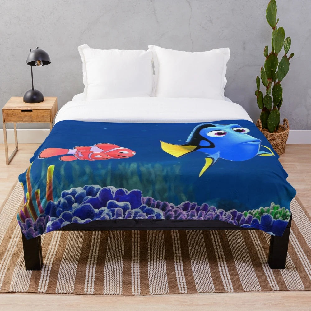 A plush and soft blanket featuring the character Nemo from the Disney Pixar movie Finding Nemo