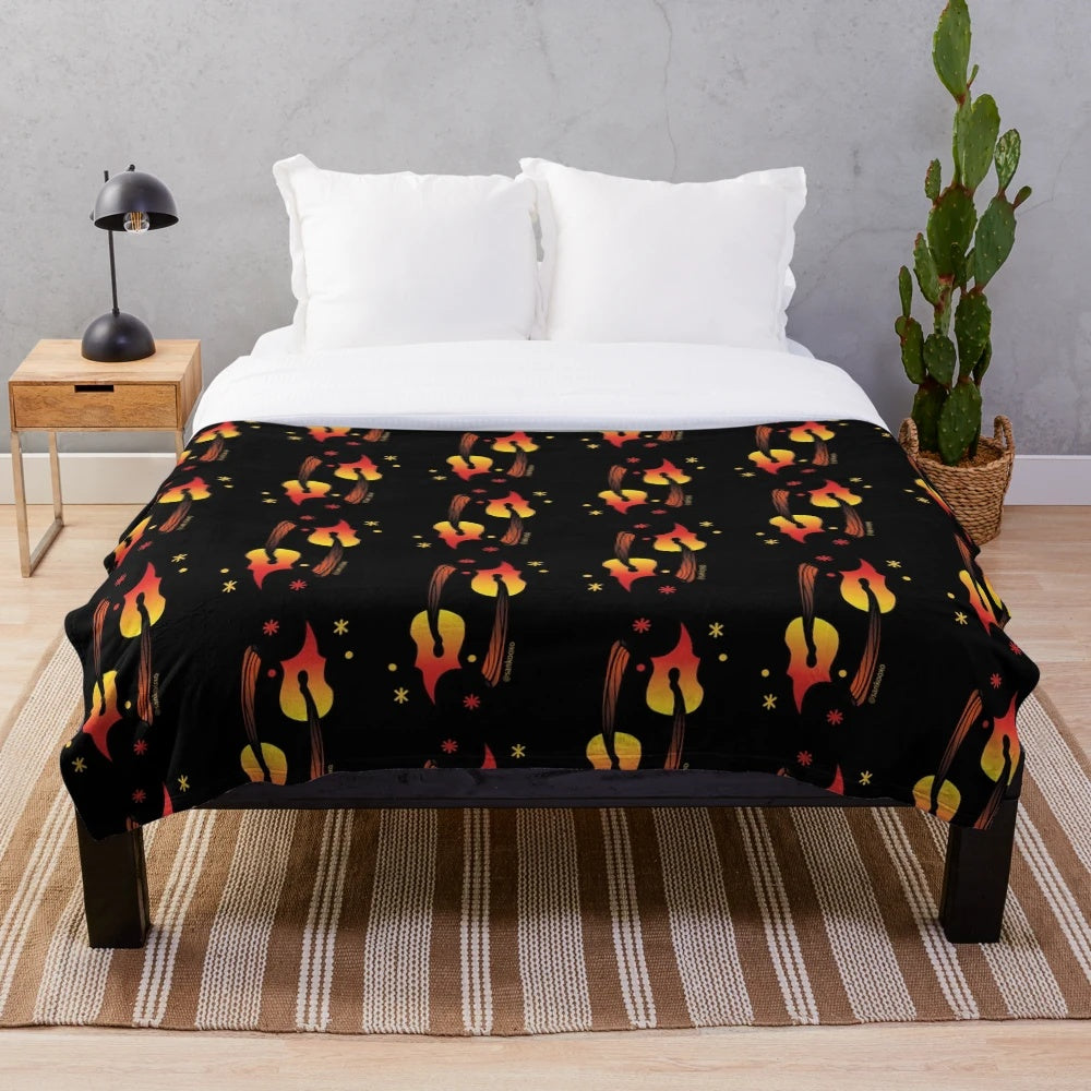 A soft and plush fire-themed blanket for a cozy and warm atmosphere
