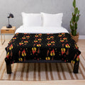A soft and plush fire-themed blanket for a cozy and warm atmosphere