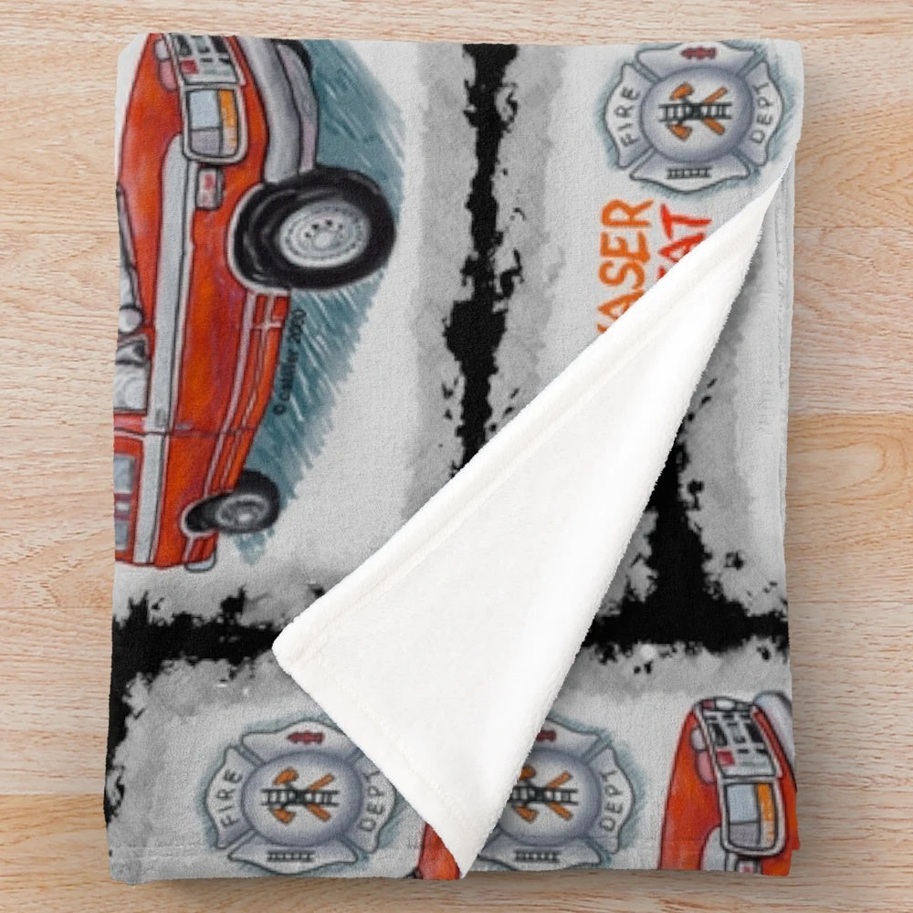 Firefighter-themed plush blanket with fire truck and emergency services design