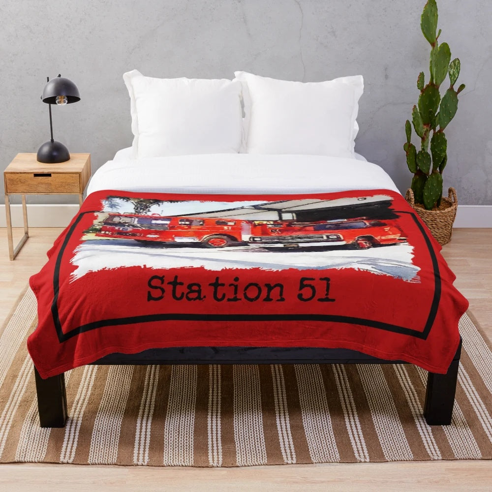 Plush blanket featuring a firetruck design inspired by the 1970s TV show 'Emergency!
