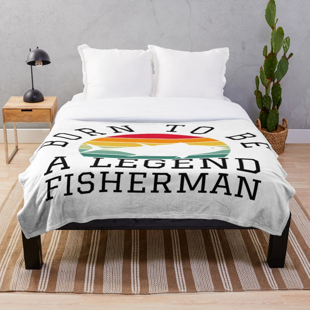 Fisherman plush blanket featuring a "Born to Be a Legend" design