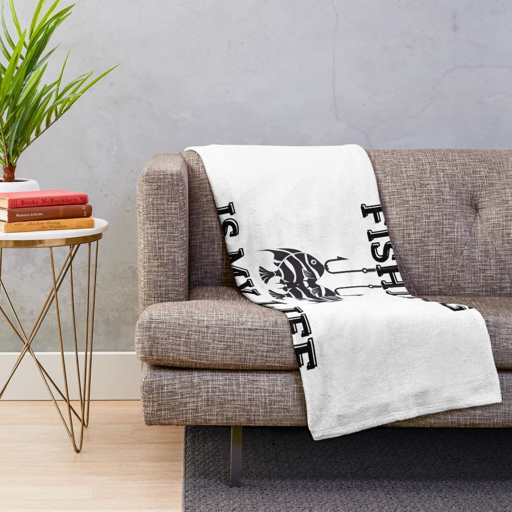 Fishing plush blanket with fishing gear and outdoor adventure imagery
