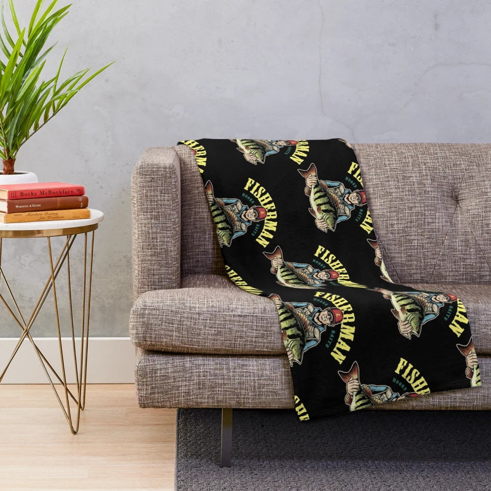 Fishing-themed plush blanket with fisherman and hooks design
