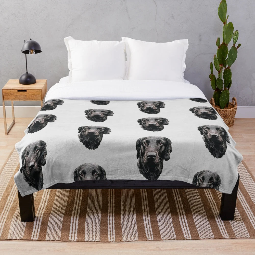 Flat coated retriever dog illustration on a plush blanket