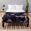 Floral black plush blanket with soft, cozy fabric