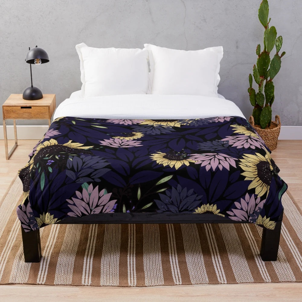 Floral black plush blanket with soft, cozy fabric